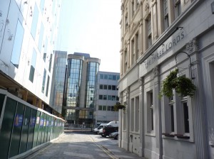 © Marilyn Roberts Hamalworth House, the shiny building, lies on the site of the old abbey church on St Clare Street EC3.