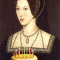 Anne Boleyn holding a birthday cake for the Anne Boleyn Files 14th birthday