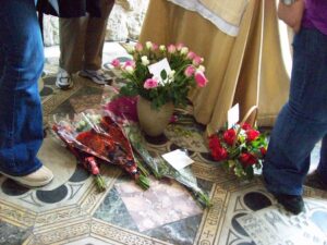 Anne Boleyn's memorial tile with flowers on it