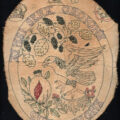 An embroidery featuring Anne Boleyn's first motto ainsi sera groigne qui groigne